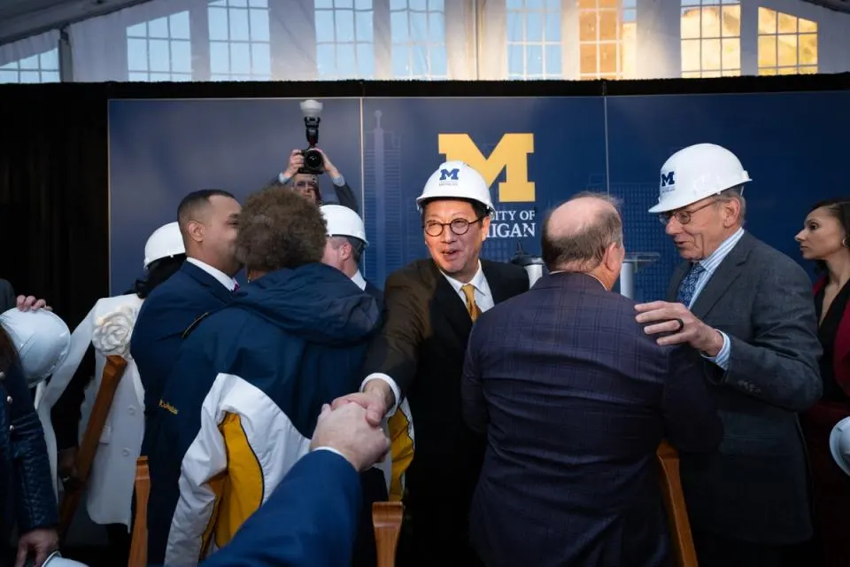 U-M President Santa J. Ono shaking hands at the UMCI groundbreaking