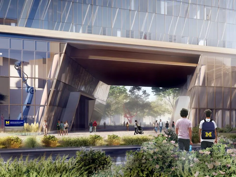 A rendering of the UMCI building at street level with people walking around the building